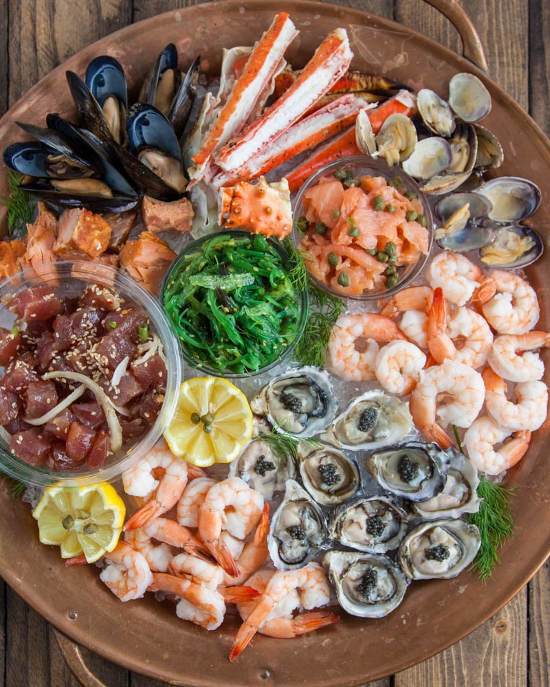 "Seafood platter with mussels, crab legs, shrimp, oysters, and smoked salmon"